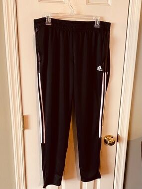 Adidas Aeroready joggers. Black with pink strips and zipper on the legs.